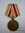 Medalha pela vitória contra a Japão com documento de concessão