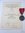 Medalla del frente del Este con documento de concesión