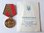 Medalla del 50 aniversario de la Victoria en la Gran Guerra Patriótica con documento de concesión