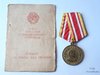 Medalla de la Victoria sobre Japón con documento de concesión